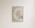 Minimalist abstract wall art with soft white circular brushstroke on neutral background