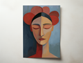 Seraphine modern portrait wall art showing a serene female face with closed eyes framed by red floral shapes