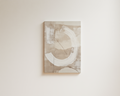 Minimalist abstract wall art with soft circular brushstroke on warm neutral background