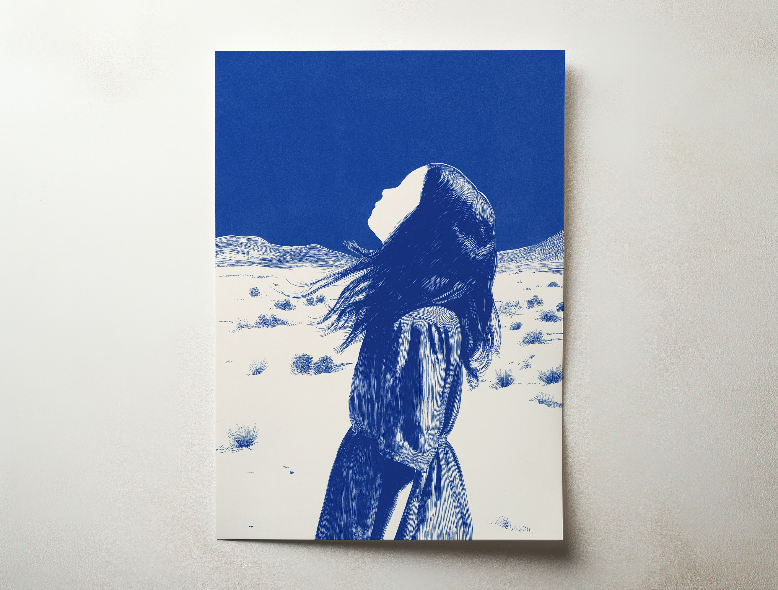 Elira minimalist portrait wall art showing a woman in a blue desert landscape looking toward the sky