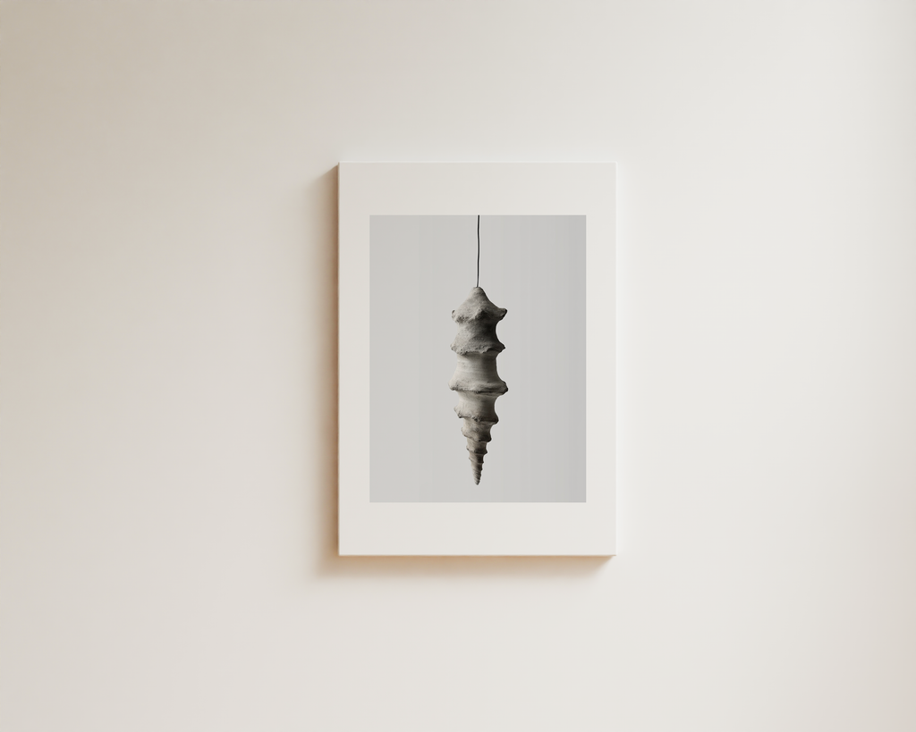 Minimal neutral wall art with sculptural hanging form