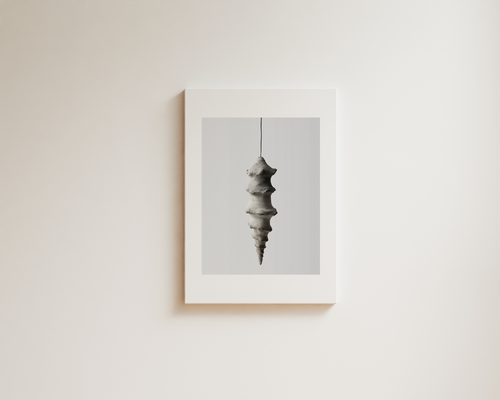 Minimal neutral wall art with sculptural hanging form